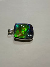 Load image into Gallery viewer, Beautiful ammolite necklace set in silver, with vibrant blues and oranges