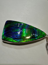 Load image into Gallery viewer, Beautiful hand-polished ammolite necklace set in silver, featuring bright vibrant blues and greens
