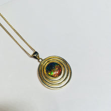 Load image into Gallery viewer, Rainbow Ammolite pendant in gold plated sterling silver setting