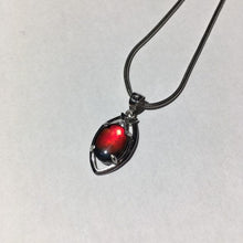 Load image into Gallery viewer, Ammolite pendant in sterling silver, sparkly midnight sky blue with  bright red and orange and pink spots