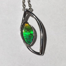 Load image into Gallery viewer, Bright little Ammolite pendant in Sterling silver. Unique dragon eye design, beautiful gem.