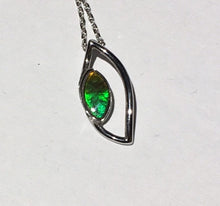 Load image into Gallery viewer, Bright little Ammolite pendant in Sterling silver. Unique dragon eye design, beautiful gem.