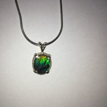 Load image into Gallery viewer, Ammolite pendant In Sterling Silver with beautiful lustre and vibrant colours of the rainbow.