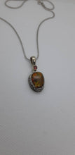 Load image into Gallery viewer, Ammolite pendant Sterling Silver with garnet