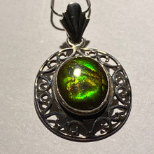Load image into Gallery viewer, Ammolite pendant in Sterling Silver with colour changing from orange to green, very pretty oval cabochon.