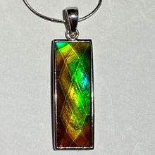 Load image into Gallery viewer, Ammolite pendant in Sterling Silver with very bright rainbow colours