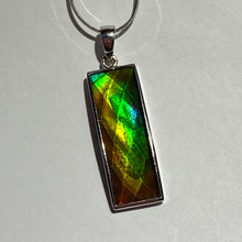Load image into Gallery viewer, Ammolite pendant in Sterling Silver with very bright rainbow colours
