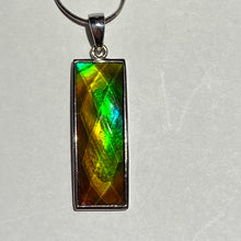 Load image into Gallery viewer, Ammolite pendant in Sterling Silver with very bright rainbow colours