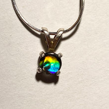 Load image into Gallery viewer, Ammolite pendant set in  Sterling Silver with vibrant rainbow flash