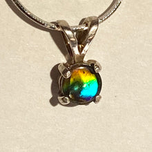 Load image into Gallery viewer, Ammolite pendant set in  Sterling Silver with vibrant rainbow flash