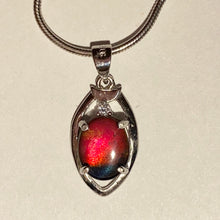 Load image into Gallery viewer, Ammolite pendant in sterling silver, sparkly midnight sky blue with  bright red and orange and pink spots