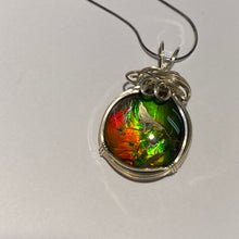 Load image into Gallery viewer, Ammolite pendant amazing colours, Sterling Silver wire wrap