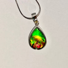 Load image into Gallery viewer, Ammolite pendant, vibrant green, yellow and red in sterling silver setting