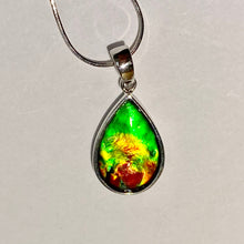 Load image into Gallery viewer, Ammolite pendant, vibrant green, yellow and red in sterling silver setting