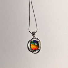 Load image into Gallery viewer, Ammolite pendant in Sterling Silver with beautiful bright rainbow colours!