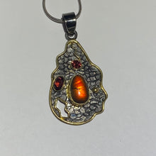 Load image into Gallery viewer, Ammolite pendant with black rhodium and gold plate with ruby