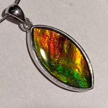 Load image into Gallery viewer, Ammolite pendant in Sterling Silver with vibrant red green and gold