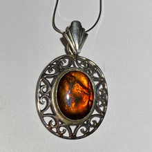 Load image into Gallery viewer, Ammolite pendant in Sterling Silver with colour changing from orange to green, very pretty oval cabochon.