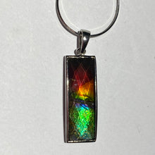 Load image into Gallery viewer, Ammolite pendant faceted set in Sterling Silver