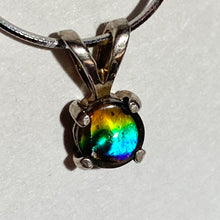 Load image into Gallery viewer, Ammolite pendant set in  Sterling Silver with vibrant rainbow flash