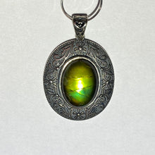 Load image into Gallery viewer, Ammolite pendant in Sterling Silver with beautiful green and blue shine.