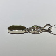 Load image into Gallery viewer, Ammolite pendant in Sterling Silver with Peridot.   Shifting colours, yellow, green, orange sparkle.