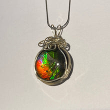 Load image into Gallery viewer, Ammolite pendant amazing colours, Sterling Silver wire wrap