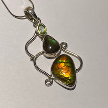 Load image into Gallery viewer, Ammolite pendant Sterling Silver with peridot