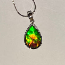 Load image into Gallery viewer, Ammolite pendant, vibrant green, yellow and red in sterling silver setting