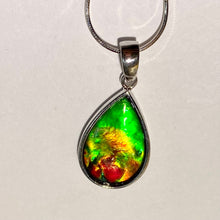 Load image into Gallery viewer, Ammolite pendant, vibrant green, yellow and red in sterling silver setting