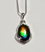 Load image into Gallery viewer, Stunning AAA Grade Ammolite pendant with perfect colour set in Sterling Silver and rhodium plated