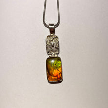 Load image into Gallery viewer, Ammolite pendant in Sterling Silver with bright orange, green and red