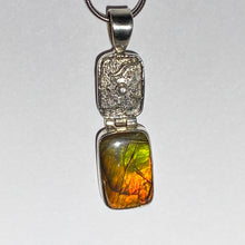 Load image into Gallery viewer, Ammolite pendant in Sterling Silver with bright orange, green and red