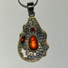 Load image into Gallery viewer, Ammolite pendant with black rhodium and gold plate with ruby