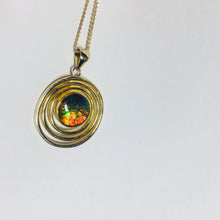 Load image into Gallery viewer, Rainbow Ammolite pendant in gold plated sterling silver setting
