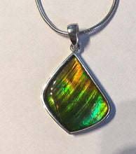 Load image into Gallery viewer, Ammolite pendant in Sterling Silver with gorgeous greens and blues, flashes of gold
