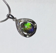 Load image into Gallery viewer, Small Ammolite pendant set in Sterling Silver with Cubic Zirconia.  Very cute & dainty.