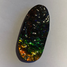 Load image into Gallery viewer, Beautiful Green/golden/orange with red and purple sparkles in darkness ammolite 66x32 mm
