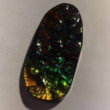 Load image into Gallery viewer, Beautiful Green/golden/orange with red and purple sparkles in darkness ammolite 66x32 mm