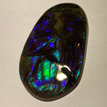 Load image into Gallery viewer, Glowing and deep purple, blue, green, aqua ammolite free form 56x32x6 mm