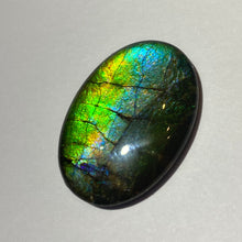 Load image into Gallery viewer, AAA+ ammolite calibrated cabochon. Beautiful green blue pink colours. 25 x 18 mm high dome quartz cap