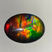 Load image into Gallery viewer, AAA+ ammolite calibrated cabochon. Beautiful rainbow colours. 40x30 mm low dome quartz cap