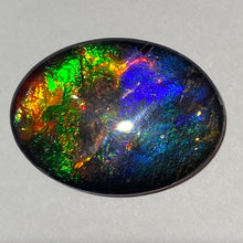 Load image into Gallery viewer, AAA+ ammolite calibrated cabochon. Beautiful pink spots and rainbows. 30x22 mm low dome quartz cap