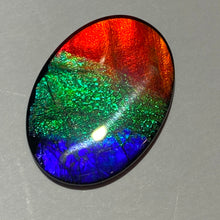 Load image into Gallery viewer, AAA+ ammolite calibrated cabochon. Beautiful red, sparkling aqua and blue colours. 25x18 mm low dome quartz cap