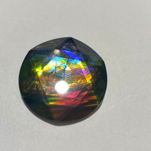 Load image into Gallery viewer, AAA+ ammolite calibrated faceted cabochon. Incredible colour, pink, purple, red, blue, gold, green 6 point star quartz cap. 30x30 mm
