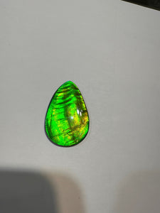Beautiful hand-polished Ammolite with vibrant yellows and greens