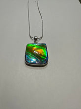 Load image into Gallery viewer, Beautiful ammolite necklace set in silver, with vibrant blues and oranges
