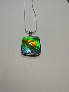 Beautiful ammolite necklace set in silver, with vibrant blues and oranges