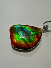 Load image into Gallery viewer, Beautiful ammolite necklace set in silver, featuring vibrant reds, yellows and blues
