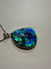 Load image into Gallery viewer, Beautiful ammolite necklace set in silver, featuring vibrant blues and greens
